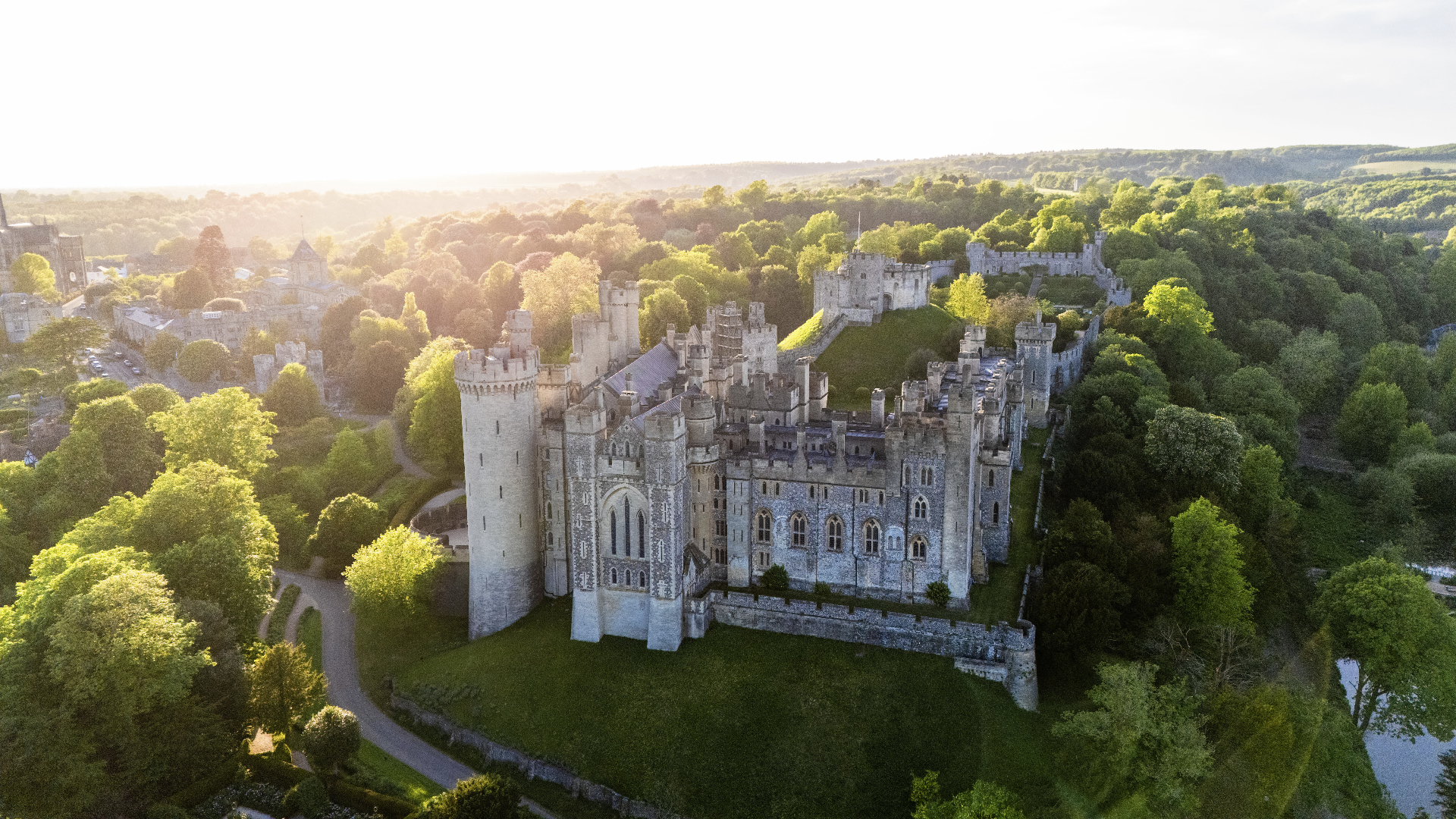 Aerial of Arundel Castle at golden hour